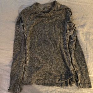 Figs under scrub shirt